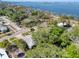 Aerial view of the property, showcasing its location and proximity to the water at 126 Orangewood Dr, Dunedin, FL 34698