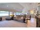 Open floor plan with living room, dining, and kitchen areas at 126 Orangewood Dr, Dunedin, FL 34698