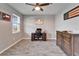 Dedicated home office with a desk, ample storage, and natural light for productivity at 13113 Rain Lily Dr, Riverview, FL 33579