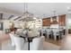 Gourmet kitchen with large island, custom cabinets, and an open floor plan with lots of natural light at 16119 Carencia Ln, Odessa, FL 33556
