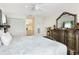 Spacious main bedroom with closet space and decoratively framed mirror on a dresser at 2182 Corinne S Ct # C, St Petersburg, FL 33712