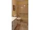 Neutral bathroom with tile flooring, a shower-tub combo, and white vanity at 2221 Norwegian Dr # 43, Clearwater, FL 33763
