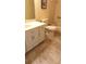 Neutral bathroom with tile flooring, a shower-tub combo, and white vanity at 2221 Norwegian Dr # 43, Clearwater, FL 33763