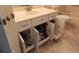 Bathroom vanity with sink and storage cabinets below, featuring hardware at 2221 Norwegian Dr # 43, Clearwater, FL 33763