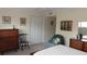 Comfortable bedroom featuring a ceiling fan, closet, and classic furniture at 2221 Norwegian Dr # 43, Clearwater, FL 33763