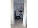 Open closet showing ample storage space with various items neatly organized inside at 2221 Norwegian Dr # 43, Clearwater, FL 33763