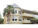 The three-story condo building has arched windows and quaint balconies at 2221 Norwegian Dr # 43, Clearwater, FL 33763