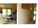 The living room with its large windows, high ceiling, and neutral colors is a welcoming space at 2221 Norwegian Dr # 43, Clearwater, FL 33763