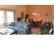 The comfortable living room features neutral walls, lots of light, and a dining area at 2221 Norwegian Dr # 43, Clearwater, FL 33763
