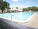 Inviting swimming pool surrounded by lounge chairs, offering a relaxing and enjoyable amenity for residents at 2221 Norwegian Dr # 43, Clearwater, FL 33763