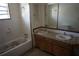 Functional bathroom with dual sinks and tiled walls at 2335 Murilla S Way, St Petersburg, FL 33712