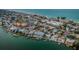 Waterfront condos featuring boat docks, neighborhood beach access, and community pool at 2515 Bay Blvd # A, Indian Rocks Beach, FL 33785