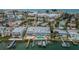 Expansive aerial perspective of a complex featuring a community pool and private boat docks at 2515 Bay Blvd # A, Indian Rocks Beach, FL 33785