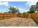 Large, private backyard featuring a newly installed wooden fence and plenty of space for outdoor activities at 2585 9Th N Ave, St Petersburg, FL 33713