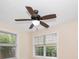 Bedroom featuring a ceiling fan, large windows, and neutral walls, creating a cozy, inviting space at 2585 9Th N Ave, St Petersburg, FL 33713