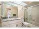 Bright bathroom featuring shower-tub combo, updated vanity and fixtures at 2636 Enterprise E Rd # C24, Clearwater, FL 33759