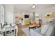 Sunlit living room and kitchen area with modern finishes and stylish decor, offering a welcoming atmosphere at 2807 N Morgan St, Tampa, FL 33602