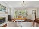 Bright living room with natural light, decorative fireplace, and hardwood floors at 2807 N Morgan St, Tampa, FL 33602