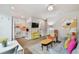 Open-concept living area with modern finishes and an adjoining kitchen at 2807 N Morgan St, Tampa, FL 33602