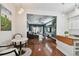 Open concept living room with lots of space and access to a dining nook and front patio at 2807 N Morgan St, Tampa, FL 33602