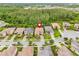 Drone view of the property highlighting proximity to community amenities and lush surroundings at 30900 Spruceberry Ct, Wesley Chapel, FL 33543