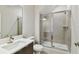 Bathroom featuring a glass shower and a white vanity at 3108 W Ballast Point Blvd, Tampa, FL 33611