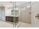 Modern bathroom with a double vanity, spacious shower and contemporary fixtures, designed for luxury and relaxation at 3108 W Ballast Point Blvd, Tampa, FL 33611