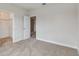 Cozy bedroom with plush carpet, access to the closet and easy access to another room at 3108 W Ballast Point Blvd, Tampa, FL 33611