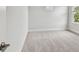 Spacious bedroom featuring plush carpet, base molding and a window providing natural light at 3108 W Ballast Point Blvd, Tampa, FL 33611
