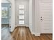 Entryway with wood floors and decorative doors with glass inserts at 3108 W Ballast Point Blvd, Tampa, FL 33611