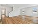 Open living space with wood floors and staircase, freshly painted at 3108 W Ballast Point Blvd, Tampa, FL 33611