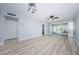 Spacious living room offering ample space, stylish flooring, and an inviting atmosphere for gatherings at 3143 Mission Grove Dr, Palm Harbor, FL 34684