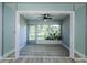 Cozy sunroom with large windows, offering a bright and airy space with serene outdoor views at 3143 Mission Grove Dr, Palm Harbor, FL 34684