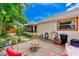 Side view of house features patio, landscaping and fence at 3435 40Th N St, St Petersburg, FL 33713