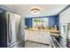 Bright kitchen with stainless steel appliances, butcher block countertops, and plenty of natural light at 3435 40Th N St, St Petersburg, FL 33713