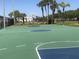 Outdoor basketball court provides recreational space amidst palm trees at 4794 Cobia Se Dr # D, St Petersburg, FL 33705