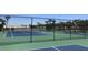 Well-maintained tennis courts surrounded by lush landscaping in a serene setting at 4794 Cobia Se Dr # D, St Petersburg, FL 33705