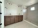 Bathroom features double sink vanity with walk in shower at 5235 9Th N Ave, St Petersburg, FL 33710