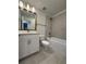 Bright bathroom with stylish vanity, modern fixtures, and a shower-tub combination at 5235 9Th N Ave, St Petersburg, FL 33710