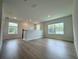 Open loft area with hardwood floors, recessed lighting, and large windows at 5235 9Th N Ave, St Petersburg, FL 33710