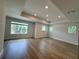 Spacious primary bedroom with tray ceiling, recessed lights, and lots of natural light at 5235 9Th N Ave, St Petersburg, FL 33710
