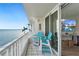 Beautiful balcony with water view, coastal decor, and outdoor seating at 5279 Isla Key S Blvd # 212, St Petersburg, FL 33715