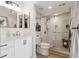 Bathroom featuring a white vanity, a large mirror, and a glass-enclosed shower at 5279 Isla Key S Blvd # 212, St Petersburg, FL 33715