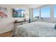 Comfortable main bedroom with water view, large television, and stylish decor at 5279 Isla Key S Blvd # 212, St Petersburg, FL 33715