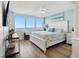 Inviting primary bedroom showcasing floor to ceiling windows with panoramic water views at 5279 Isla Key S Blvd # 212, St Petersburg, FL 33715