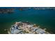 Exclusive waterfront property boasting private docks and luxurious amenities with panoramic bay views at 5434 Oakhurst Dr, Seminole, FL 33772
