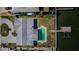 Aerial shot showing a pool and boat dock of a single Gathering home at 5434 Oakhurst Dr, Seminole, FL 33772