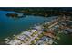 Panoramic aerial view of waterfront homes showcasing expansive water views and serene coastal living at 5434 Oakhurst Dr, Seminole, FL 33772