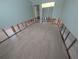 Bedroom featuring light-colored walls and flooring, leading to the closet and bathroom is currently under remodel at 5434 Oakhurst Dr, Seminole, FL 33772