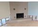 Spacious Living Room with a brick fireplace and light colored flooring is being remodeled at 5434 Oakhurst Dr, Seminole, FL 33772